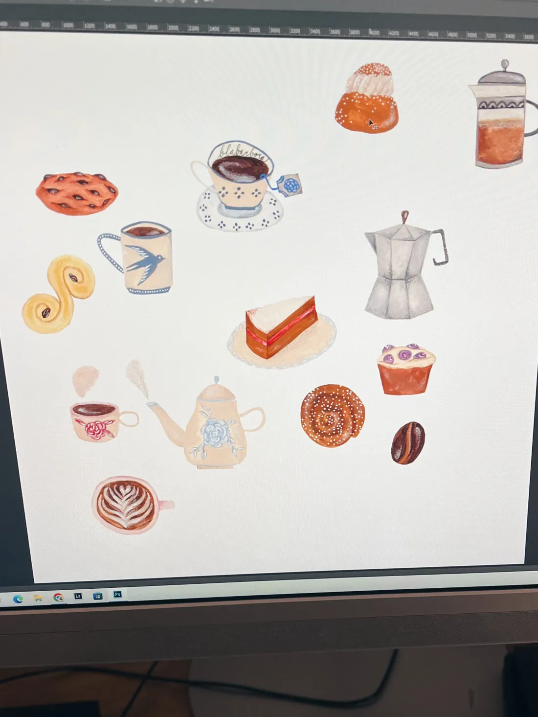 Na monitoru rozptýlené akvarelové ilustrace kávy, čaje, šneků, semly a dalšího sladkého pečiva.