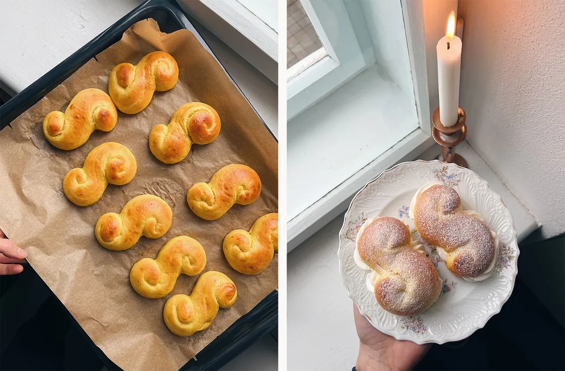 Zlaté šafránové lussekatter v S-tvaru na plechu vlevo, vpravo plněné šlehačkou na talíři se svíčkou.